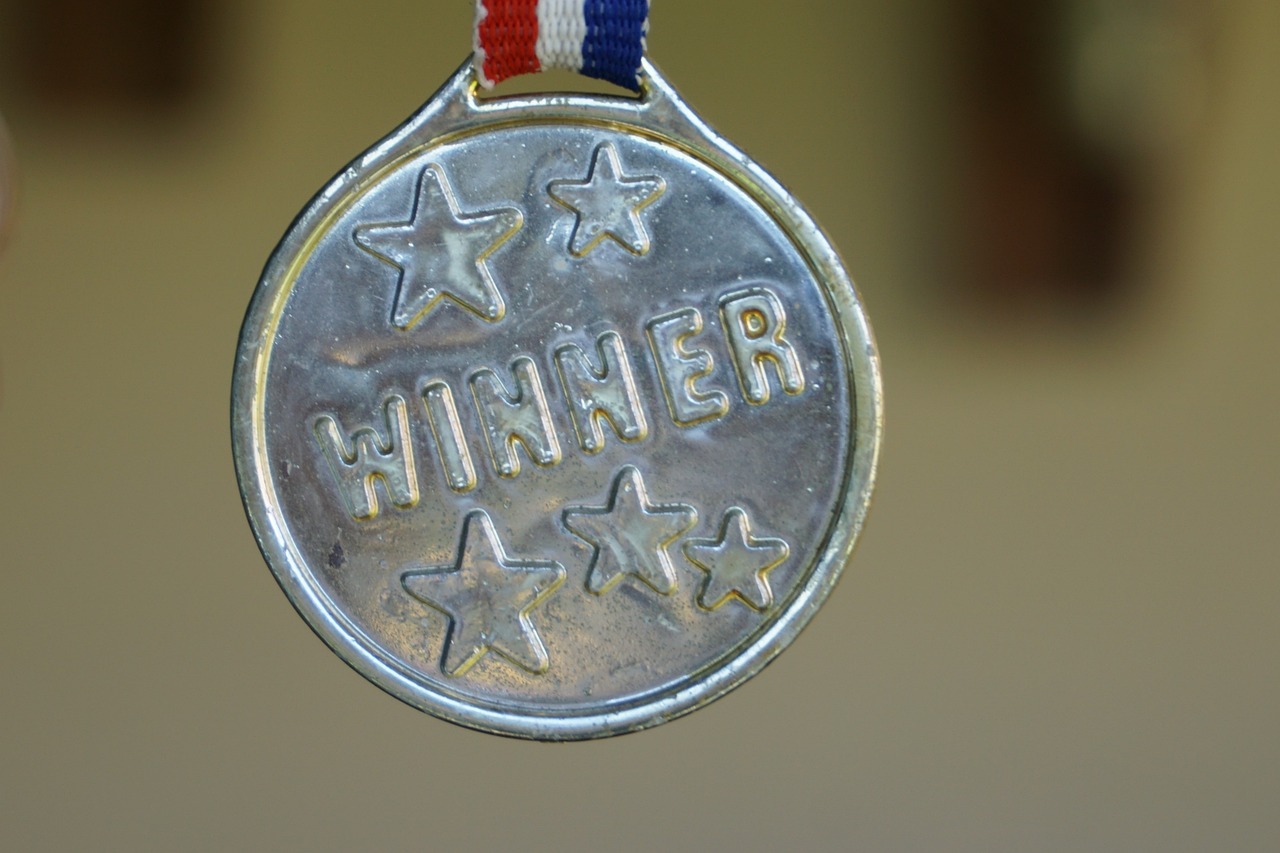 Silver medal depicting the word Winner